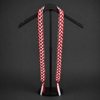 3 strand Red and white personalized Ribbon Lei with glitter on a black stand against a dark background